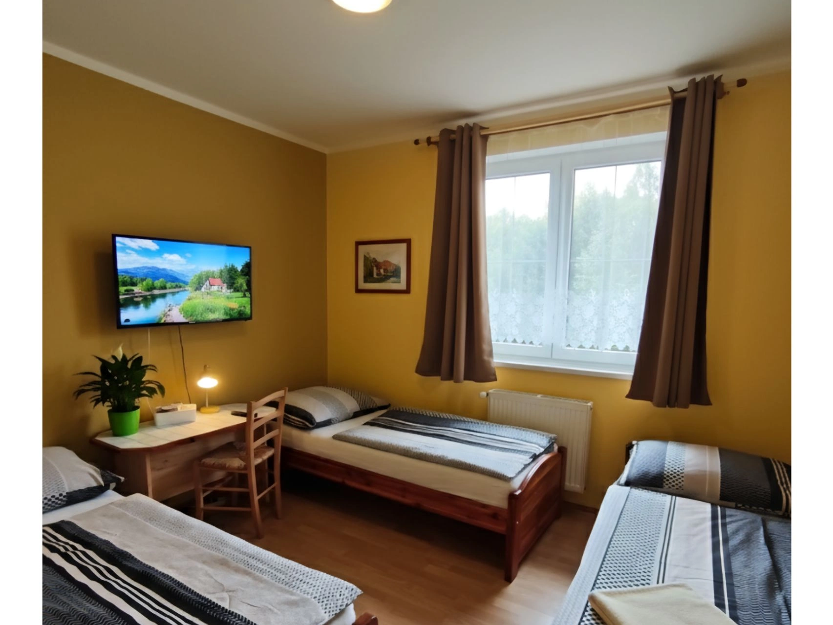 Třílůžkový pokoj s oddělenými postelemi